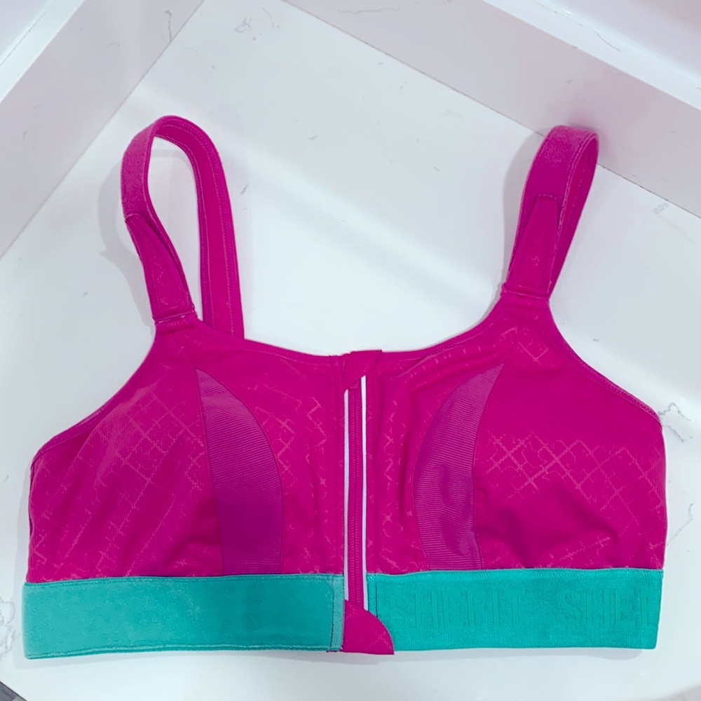 Shefit ultimate sports bra 3luxe in fuscia and teal.
